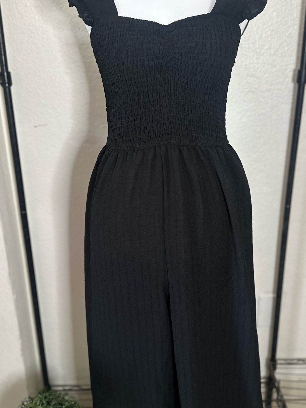 Smocked Black Wide-Leg Jumpsuit with Flutter Straps